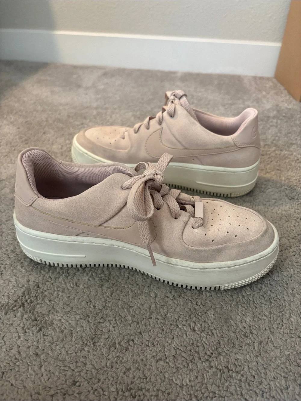 Nike Women’s Pink Suede Platform Sneakers